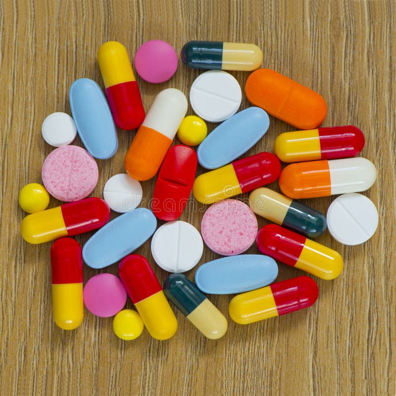 Rainbow of Tablets and Capsules Stock Image Image of help