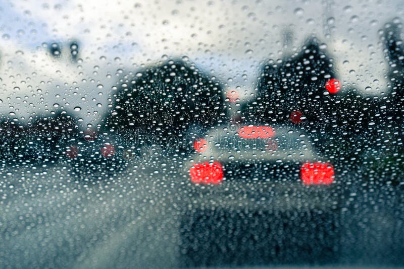 raindrops-windshield-rainy-day-blurred-car-stopped-raindrops-windshield-rainy-day-blurred-car-stopped-133617936.jpg