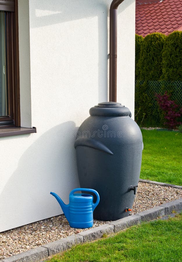 Rainwater barrel downspout modern design house exterior