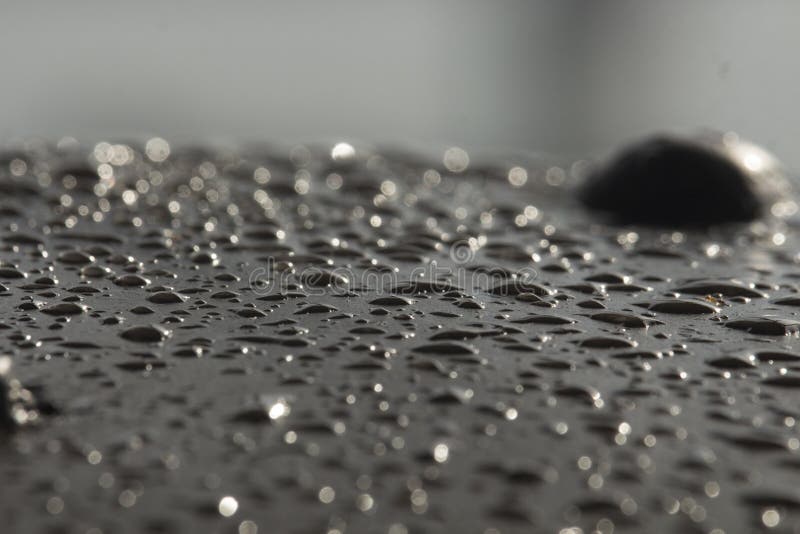 The Rain Water Falling on the Iron Bar Has Created Such a Scene Stock