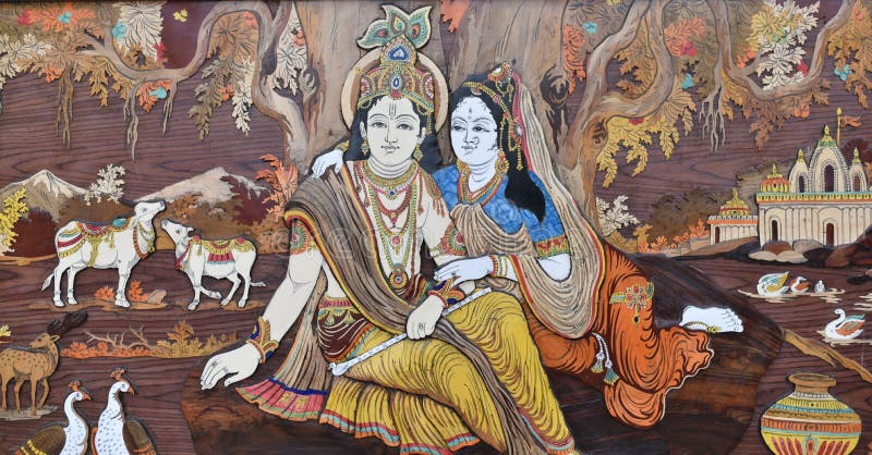 Raised crafted Indian Hindu Gods Krishna and Radha on wood, whole background stock photo