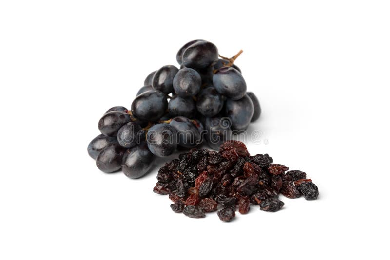 Raisin and grapes isolated on white background