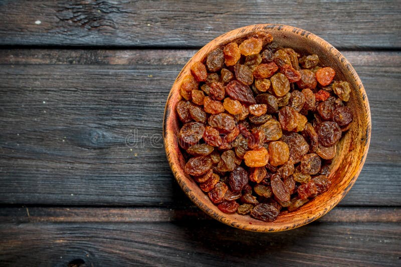 Raisins in bowl royalty free stock photo