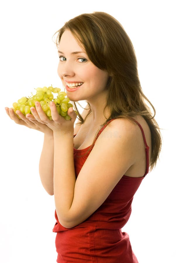 raisins de fille heureux photographie stock libre de droits raisins de fille heureux photographie stock libre de droits