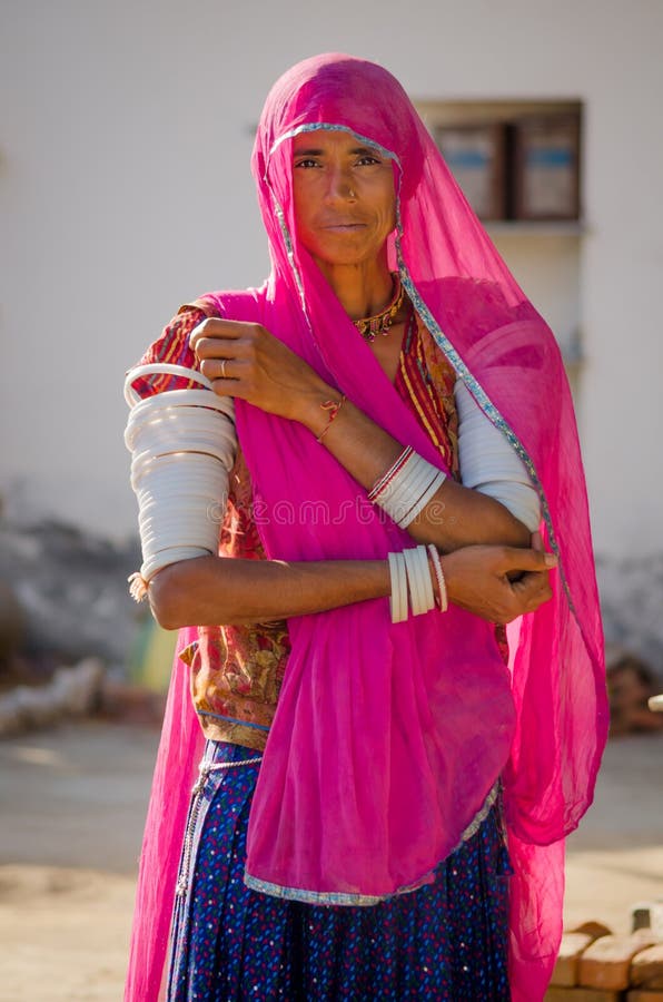 Portrait of a woman smiling in traditional Rajasthani dress, Pushkar,  Ajmer, Rajasthan, India, Stock Photo, Picture And Rights Managed Image.  Pic. PNM-PIRM-20121123-ML0091 | agefotostock