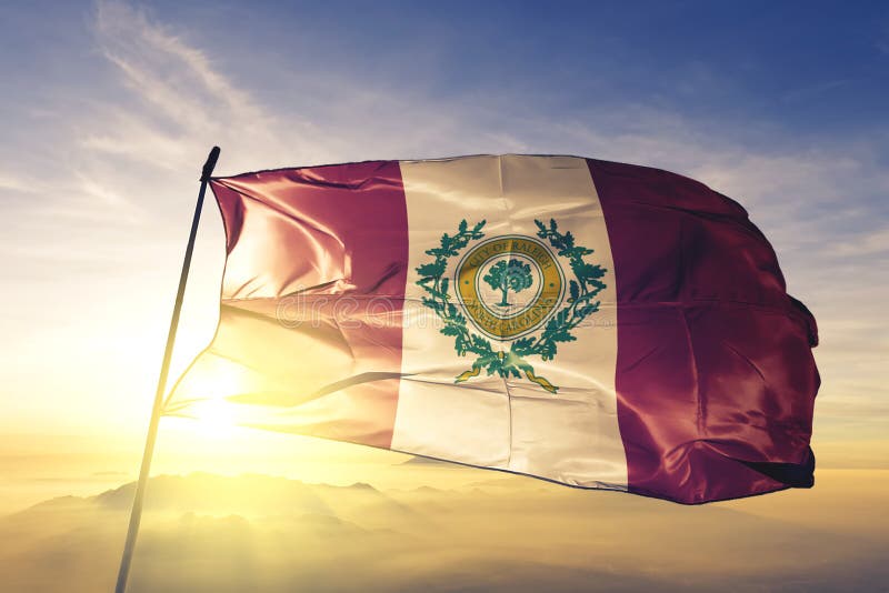 Raleigh city capital of North Carolina of United States flag textile cloth fabric waving on the top sunrise mist fog royalty free illustration Raleigh city capital of North Carolina of United States flag textile cloth fabric waving on the top sunrise mist fog royalty free illustration