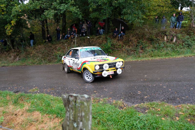 A Rallye car sliding in the Belgian Ardennes region