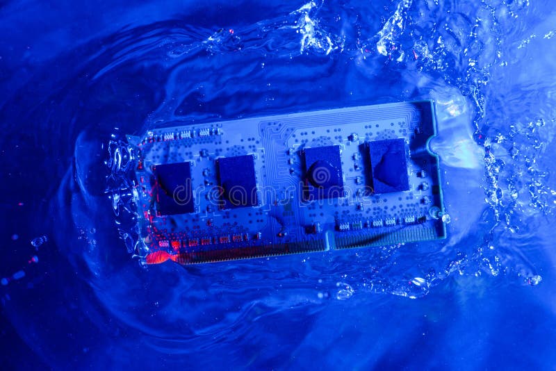 RAM memory from a laptop, ram. Blue and red light, under water. Technology of cyber-electronic concept. Technological background stock photos