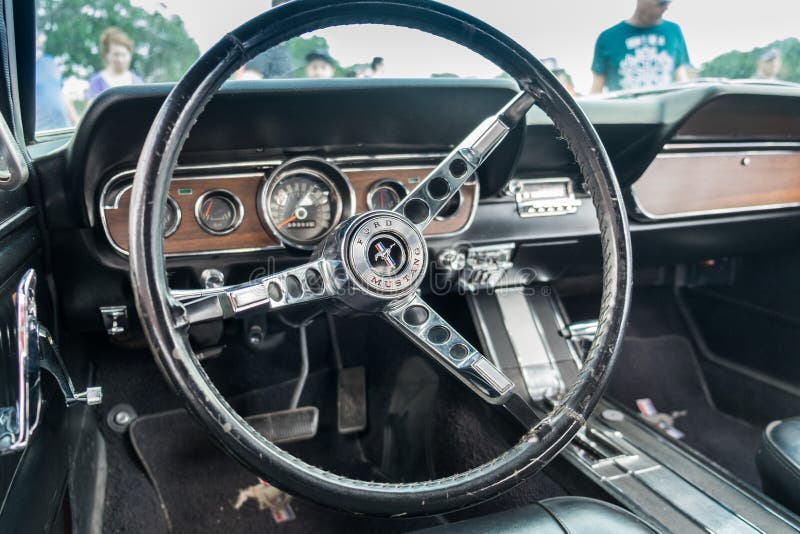 1966 vintage Ford Mustang interior - steering wheel with logo and dashboard stock photo 1966 vintage Ford Mustang interior - steering wheel with logo and dashboard stock photo