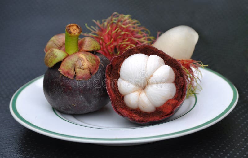Rambutan and Mangosteen stock image. Image of food, fruit 20543985