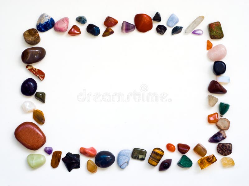 Frame made from gemstones and crystals isolated on white. Frame made from gemstones and crystals isolated on white.