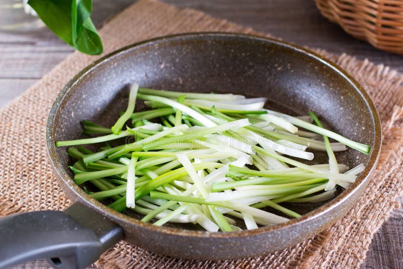 Ramson or Wild Garlic Leaves in the Pan. Cooking Stock Photo Image of