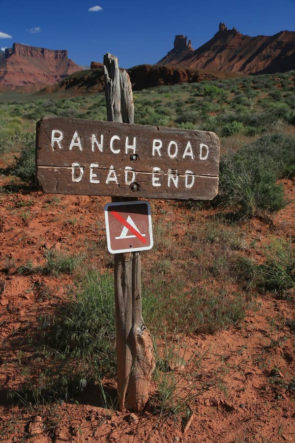 Ranch road Utah dead end w/ mountains background near Moab, Utah