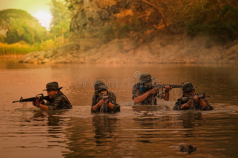 Rangers wade through the water to randomly shoot and attack