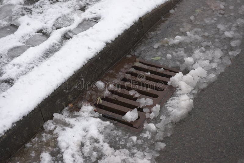 4 - Rapidly melting snowfall runs into roadside surface drain