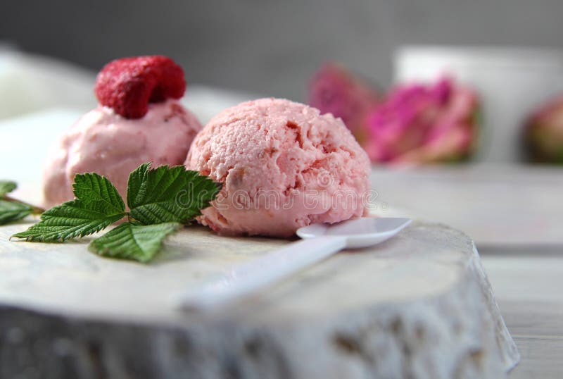 Raspberry ice-cream on a wooden Board royalty free stock image Raspberry ice-cream on a wooden Board royalty free stock image