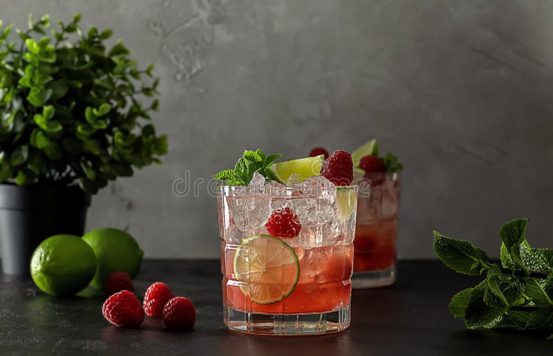 Raspberry Lime Vodka Cocktail with Mint and Ice. Refreshing Alcoholic