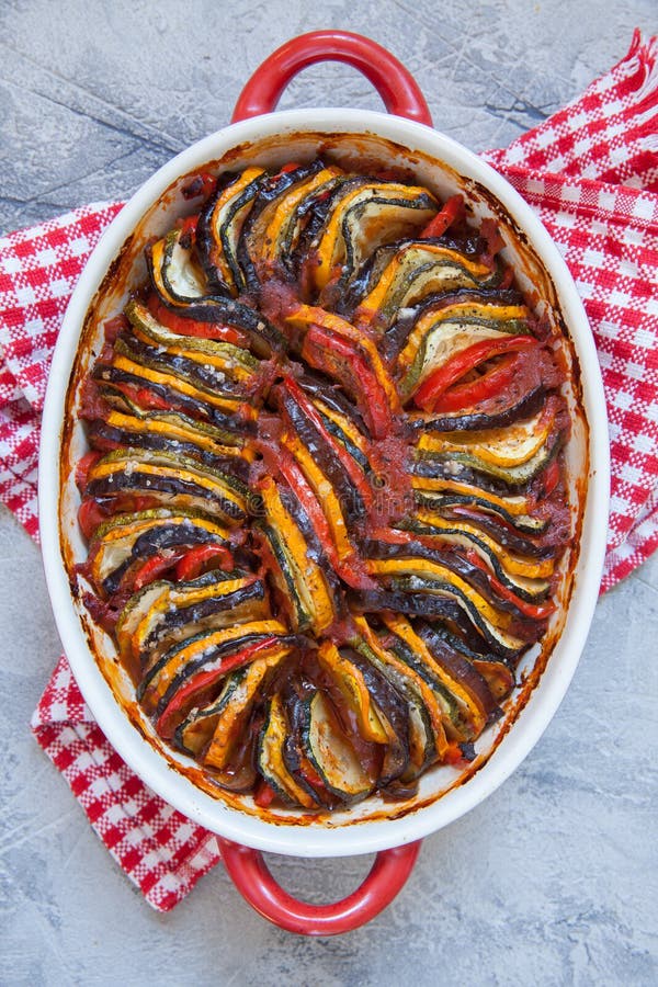 Ratatouille - traditional French Provencal vegetable dish cooked in oven. Homemade preparation recipe healthy diet stock photo Ratatouille - traditional French Provencal vegetable dish cooked in oven. Homemade preparation recipe healthy diet stock photo