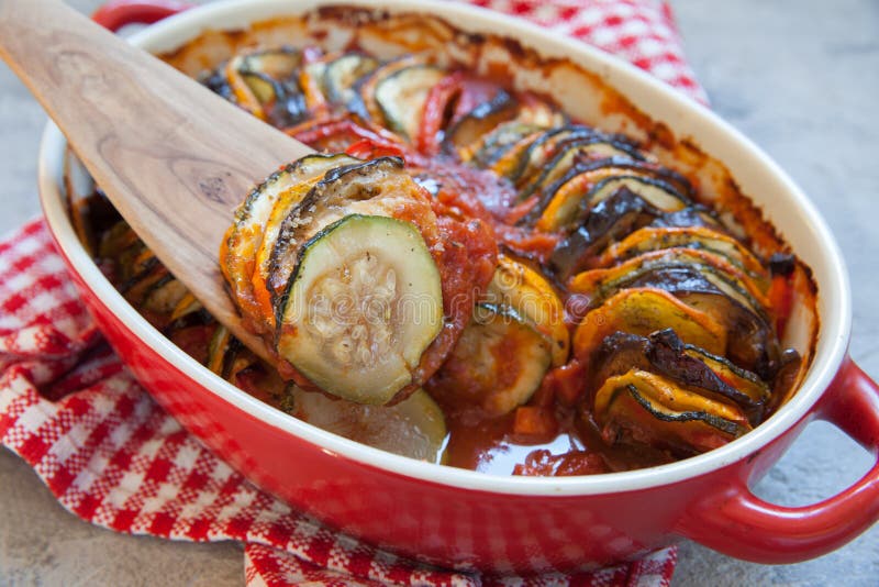 Ratatouille - traditional French Provencal vegetable dish cooked in oven. Homemade preparation recipe healthy diet royalty free stock image Ratatouille - traditional French Provencal vegetable dish cooked in oven. Homemade preparation recipe healthy diet royalty free stock image