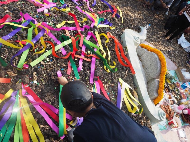 Ratchaburi , Thailand - April 05,2018 : Thai people decorating colorful paper decoration on Chinese graveyard in Qingming Festival royalty free stock image Ratchaburi , Thailand - April 05,2018 : Thai people decorating colorful paper decoration on Chinese graveyard in Qingming Festival royalty free stock image