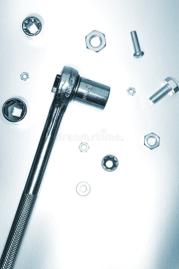 Ratchet, nuts and bolts stock photo. Image of metallic 2559204
