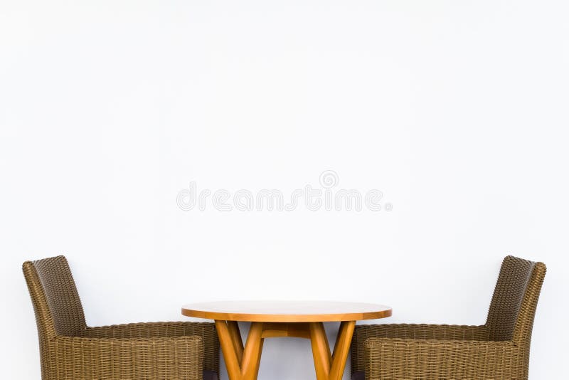 Rattan Chairs on Blank White Wall