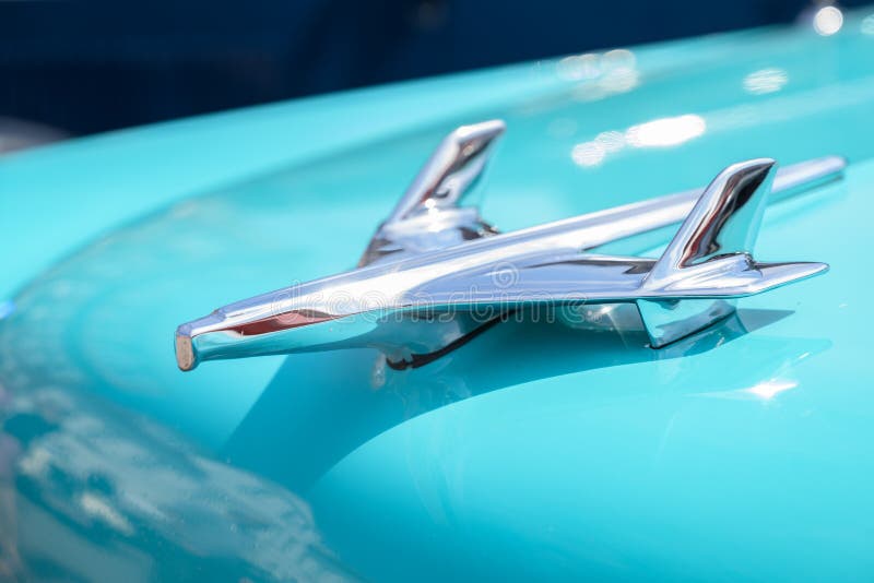 RATZEBURG, GERMANY - JUNE 3, 2019: Plane from chrome, the hood ornament of a Chevrolet automobile, classic Chevy Bel Air from 1956