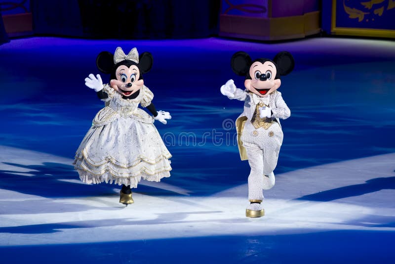 Minnie and Mickey mouse skate out during the finale of Disney on Ice Dare to Dream. Minnie and Mickey mouse skate out during the finale of Disney on Ice Dare to Dream
