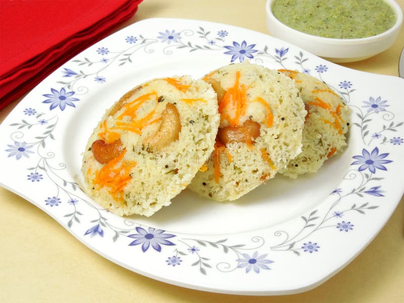 Rava Idli indisk vegetarisk mat royaltyfri bild Rava Idli indisk vegetarisk mat royaltyfri bild