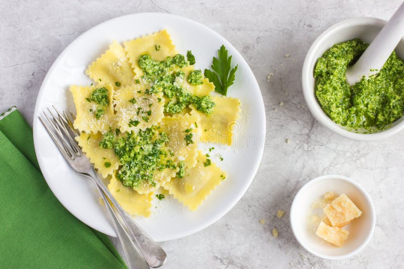 Ravioli with pesto sauce stock photo. Image of meal, parsley 74173062