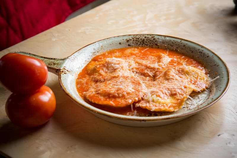 Ravioli in sauce. Lunch. Ravioli Medallions with Marinara Sauce. Ravioli in sauce. Lunch. Ravioli Medallions with Marinara Sauce.