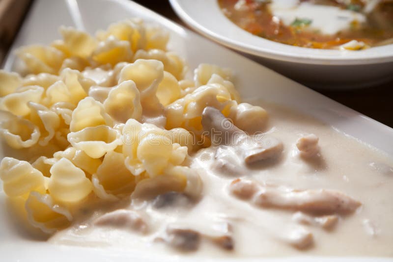 Ravioli with white sauce stock image. Image of tasty 36561141