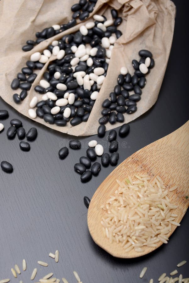 Raw beans and brown rice stock image. Image of vegetarian 50924319
