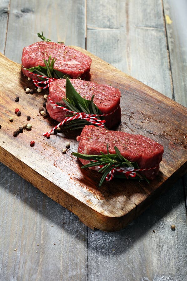 Raw Beef Fillet Steaks with Spices for Bbq Grilling. Stock Image