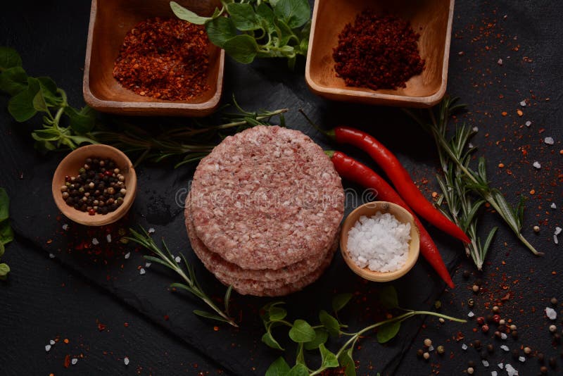 Raw Beef Hamburger Patties with Herbs and Spices. Stock Image Image
