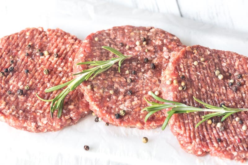 Raw beef patties stock photo. Image of delicious, portion - 127603316