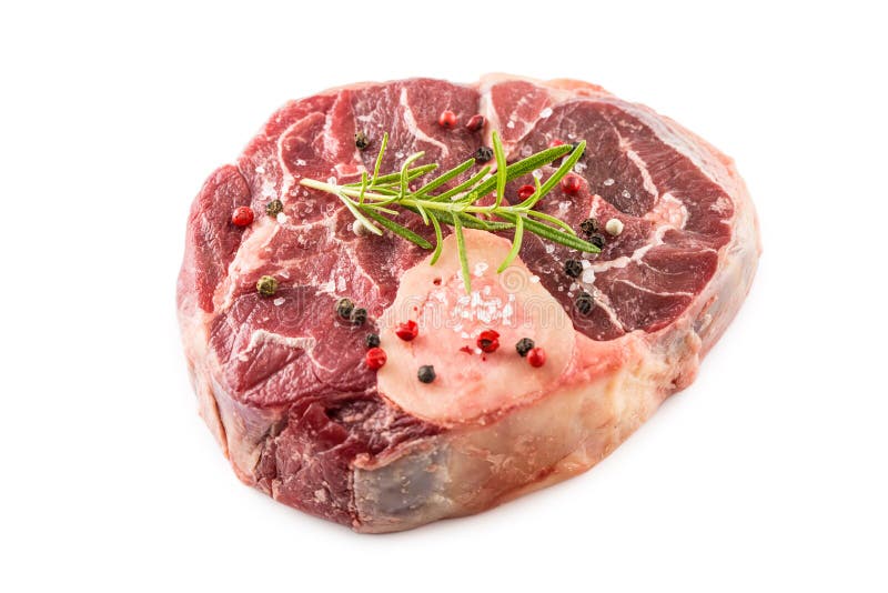 Raw beef shank with salt pepper and rosemary isolated on white background