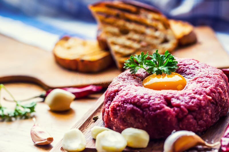 Raw Beef .Tasty Steak Tartare. Classic Steak Tartare on Wooden B Stock ...