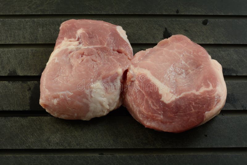 Raw boneless pork chops