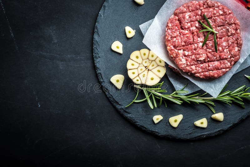 Raw cutlet for homemade burger stock photography Raw cutlet for homemade burger stock photography