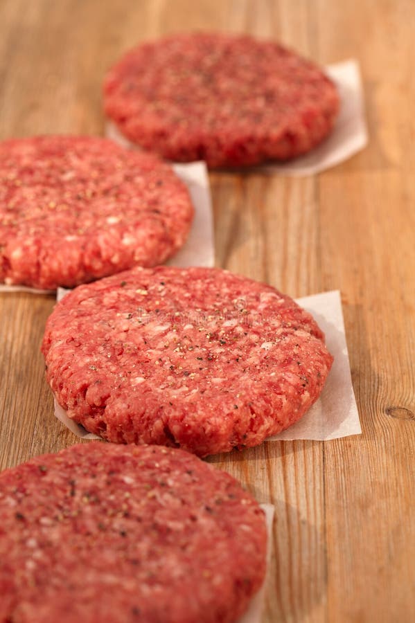 Raw Burgers For Hamburgers, In A Pile Stock Image - Image of fresh ...