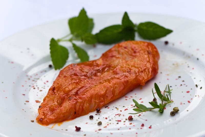 Raw chicken Breast, marinated , with herbs