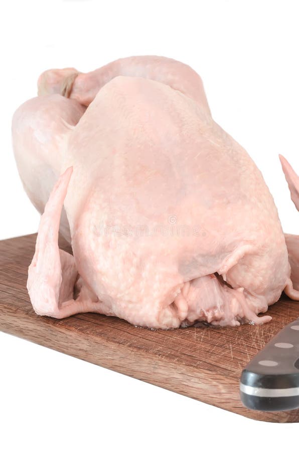 Raw Chicken Carcass on Cutting Board Isolated Stock Photo Image of