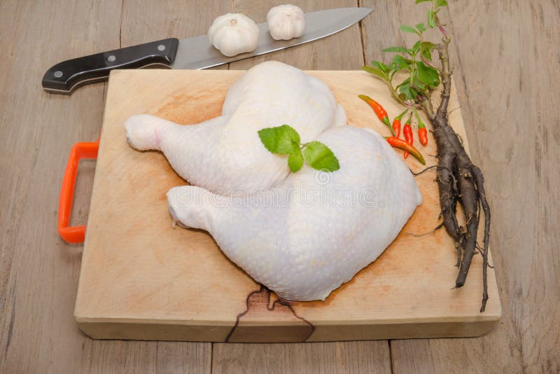 Raw Chicken Drumstick on Cutting Board Stock Image Image of animal