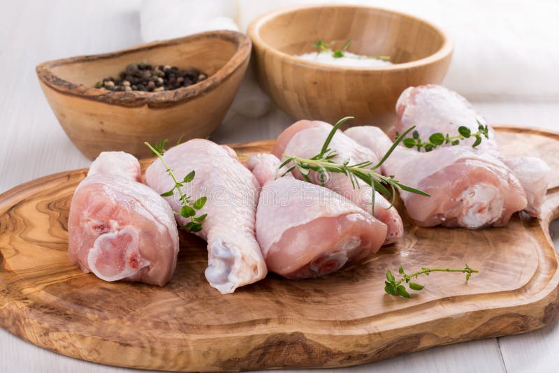 Raw chicken drumsticks stock photo. Image of protein 134686454