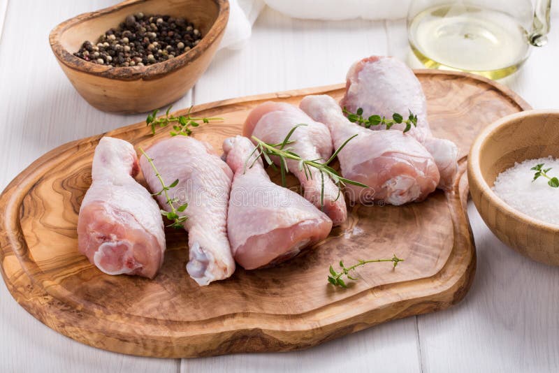 Raw chicken drumsticks stock photo. Image of protein 134686454