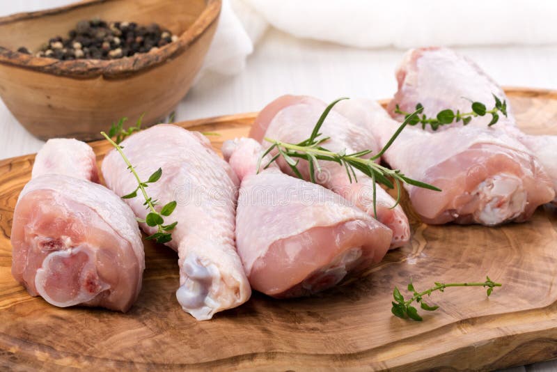 Raw chicken drumsticks stock photo. Image of protein 134686454