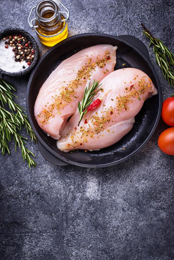 Raw Chicken Fillet In Cast Iron Pan Stock Photo - Image of ...