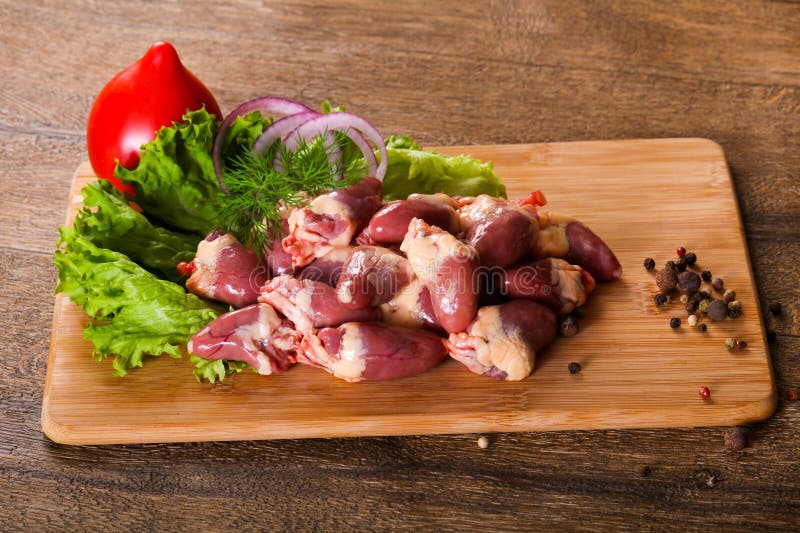 Raw chicken hearts stock photo. Image of cuisine, background 119972768