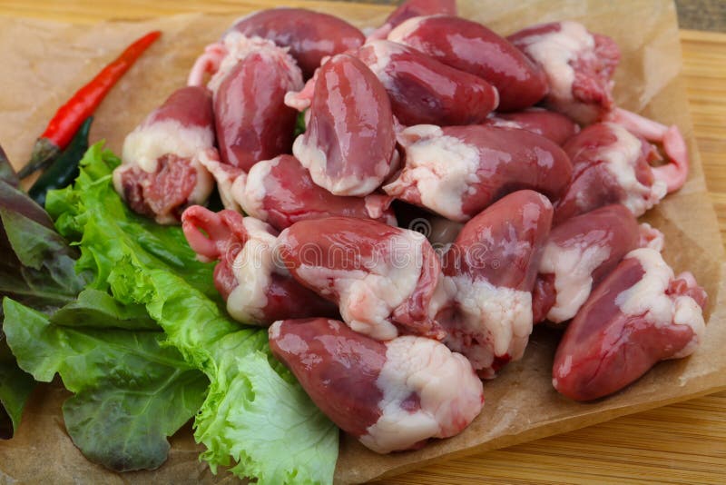 Raw chicken hearts stock photo. Image of offal, delicious 111780456